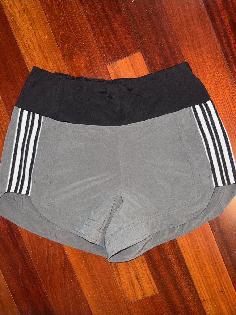 Athleta Gray Athletic Shorts with Black Waistband and White Stripe Detail